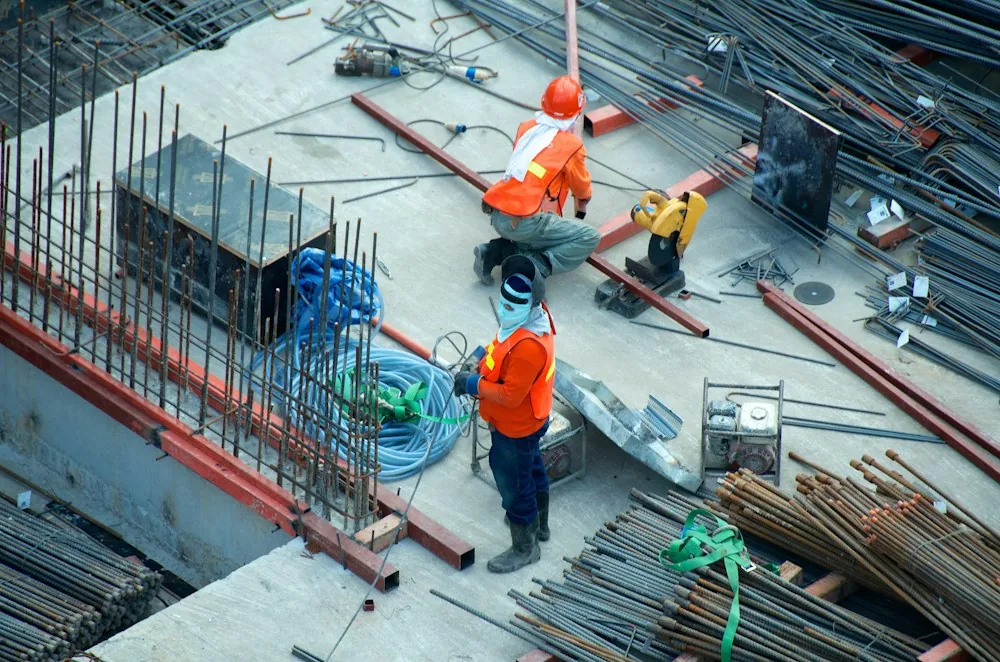Elyra crew working on rebar at an active site